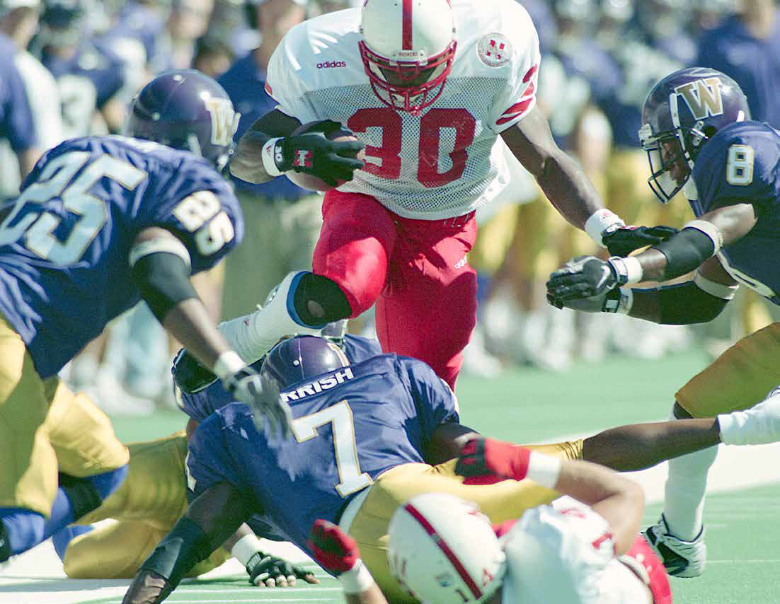 Ahman Green leaps a defender